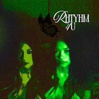 two women in a dark room with the words rittym u