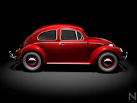 a red volkswagen beetle on a black background
