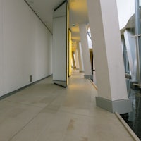 a hallway with white walls