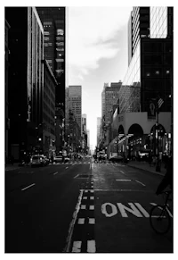 a black and white photo of a city street
