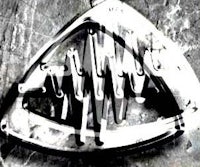 a black and white image of a triangle on a wall