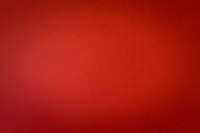 a red background with a light shining on it
