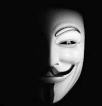 an image of a v for vendetta mask on a black background