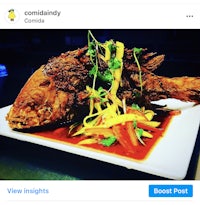 a picture of a plate with a fish on it
