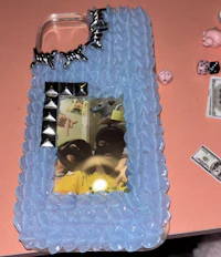 a blue phone case with a picture on it