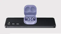 samsung earphones with a purple cover on top of a phone