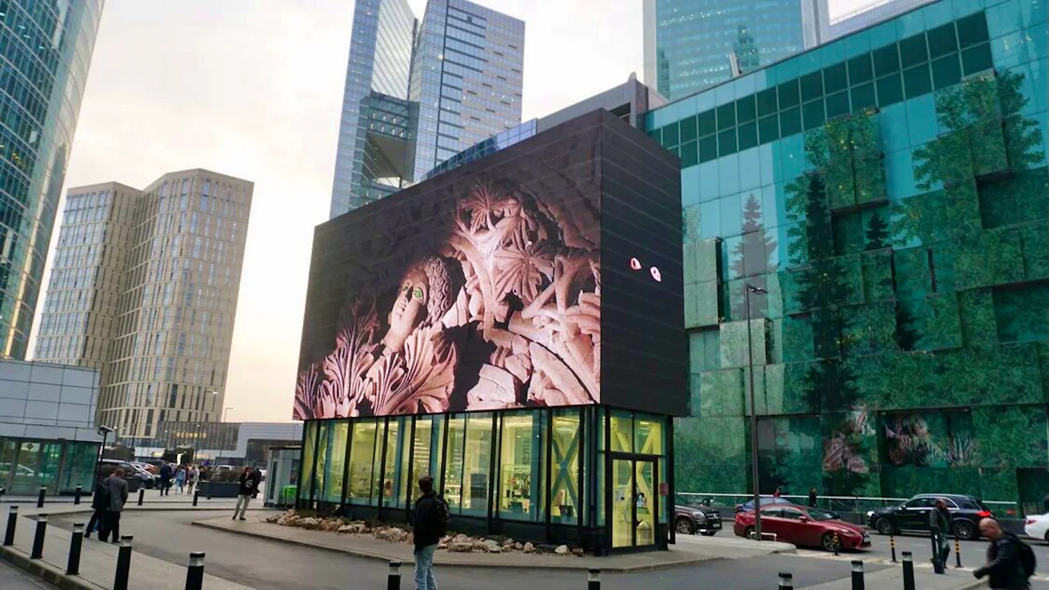a large led screen in the middle of a city