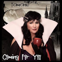 a woman in a costume holding an apple in front of a castle