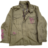 a green jacket with a pink heart on it