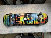 a skateboard with a colorful design on it