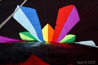 the inside of a colorful hot air balloon
