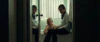 a man and a woman sitting in a bathtub