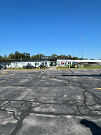 a parking lot with a lot of parked cars
