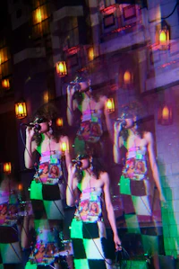 a woman singing into a microphone