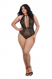 a plus size woman in a black lace bodysuit