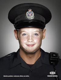 a police officer wearing a hat with a child's face on it