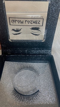 a pair of false eyelashes in a box