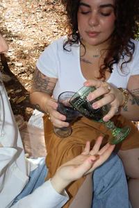 a woman holding a wine glass