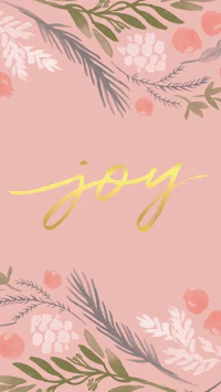 a pink card with the word joy in gold lettering