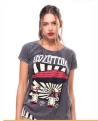 a woman wearing a t - shirt that says led zeppelin