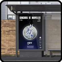 a bus stop with a poster on it