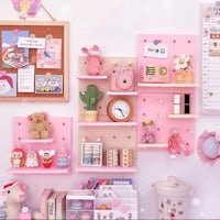 a pink room with a lot of kawaii items