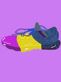 a colorful running shoe on a purple background
