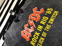 a t - shirt that says ac/dc rock in the rio