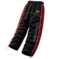 a black and red jogging pant on a black background