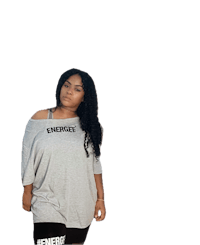 a woman wearing a grey t - shirt and black leggings