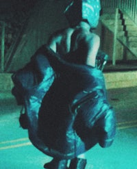 a person riding a skateboard at night