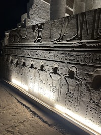 an egyptian inscription on a wall