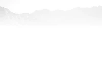 a man is riding a bike on a foggy day