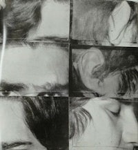 a black and white photo of a man's face