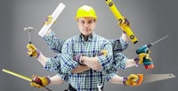 a construction worker with tools in his hands