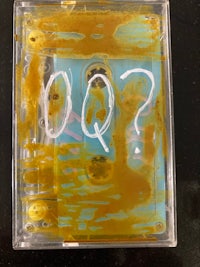 a cassette with the word q on it