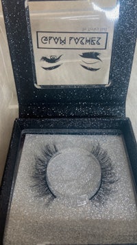 a pair of false eyelashes in a box