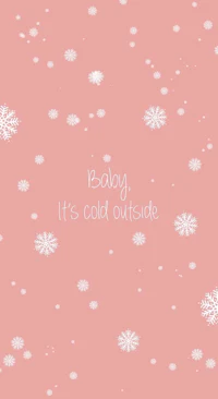 a pink background with snowflakes and the words baby it's cold outside
