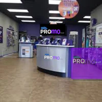 a store with a purple sign and a purple sign