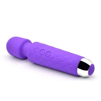 a purple vibrating toy on a white background