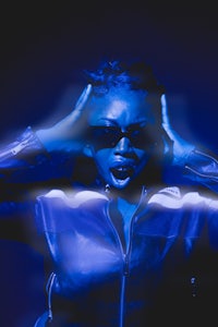 a woman in a blue jacket