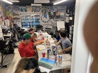 a group of people sitting around a table