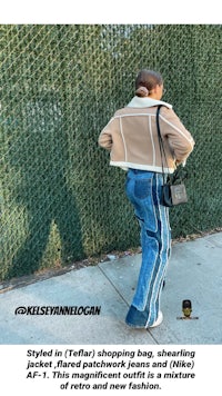 a woman is walking down the street with a shopping bag