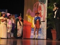 a group of children on stage