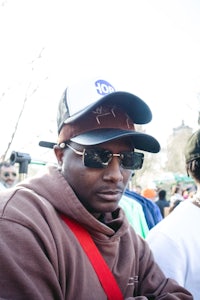 a man wearing sunglasses and a hat