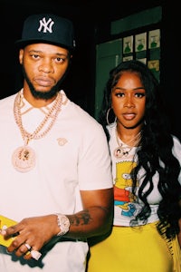 a man and woman standing next to each other