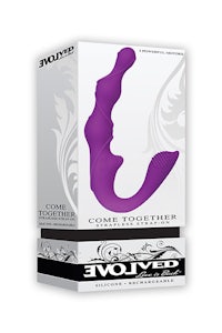 a purple sex toy in a box