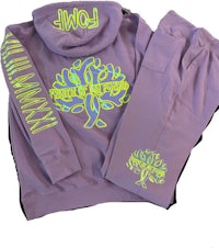 a purple hoodie and pants with a neon tree on them