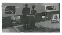 a black and white photo of a man and woman standing on stairs