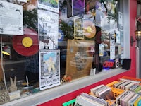 a storefront with a lot of records on display